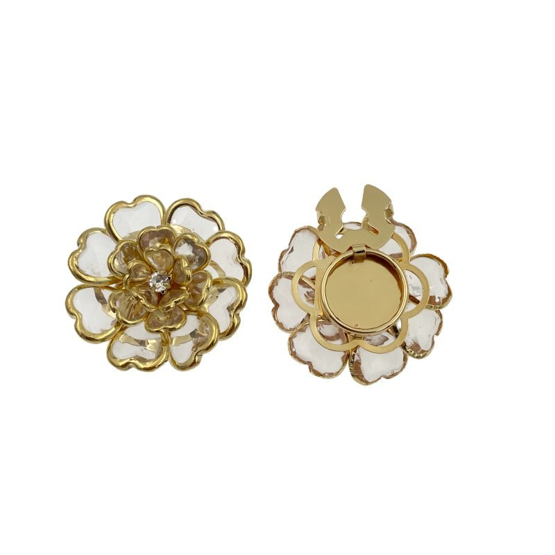 Camélia Cristal – cache-bouton de manchette Coup de Fleur