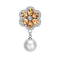 Ambre Royale – cache-bouton de manchette Coup de Fleur