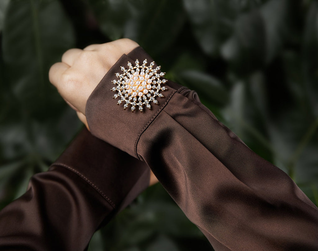 Étoile Dorée – cache-bouton de manchette Coup de Fleur
